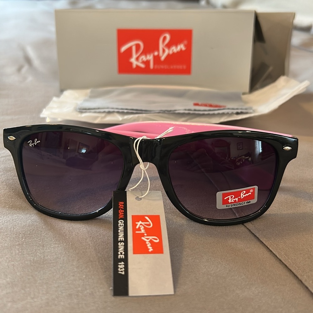 Rayban sunglasses, 55-21-145, never used, black with pink arms.